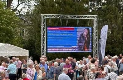 Crowd watching screen
