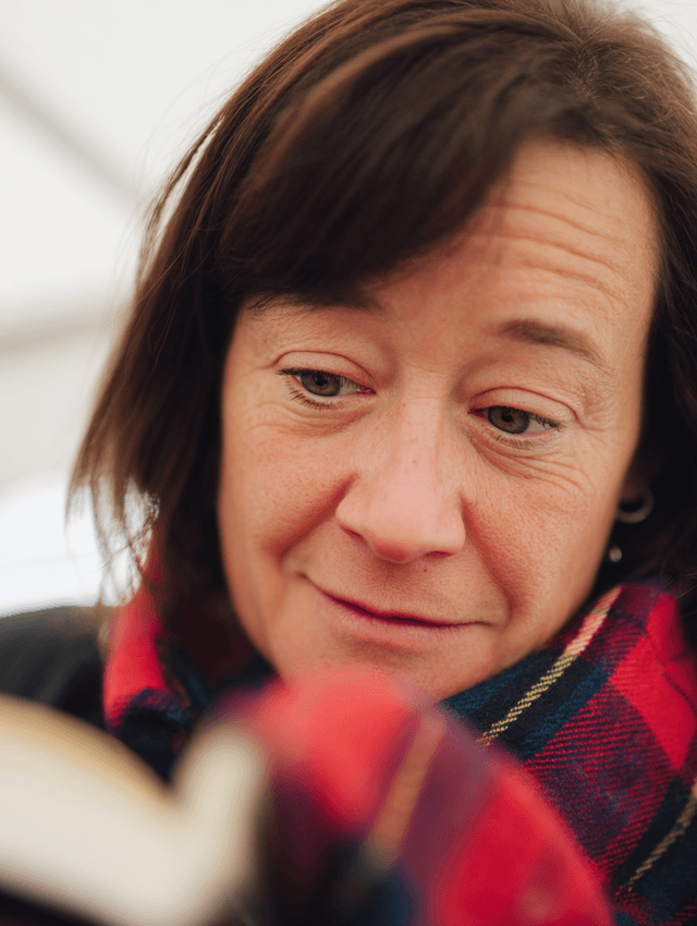 Festival reader absorbed in a book